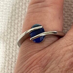 Modernistic 316L stainless steel and blue stone ring.